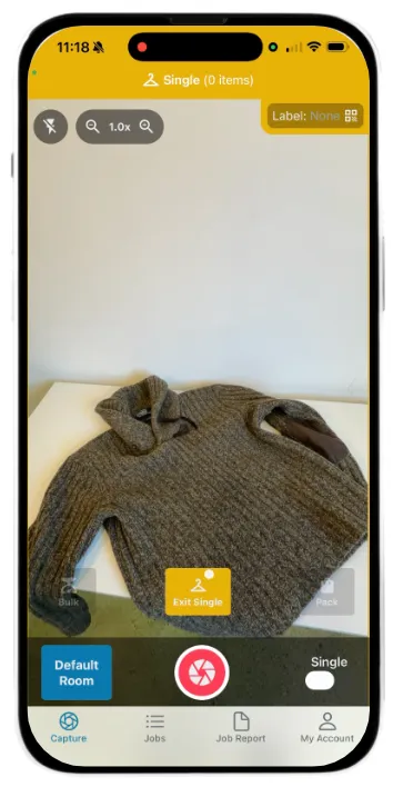 Taking photo of specialty garment showing brand label