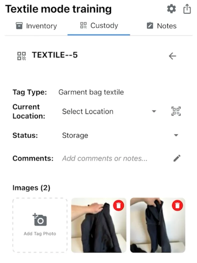 Opening garment bag label to see associated images and details